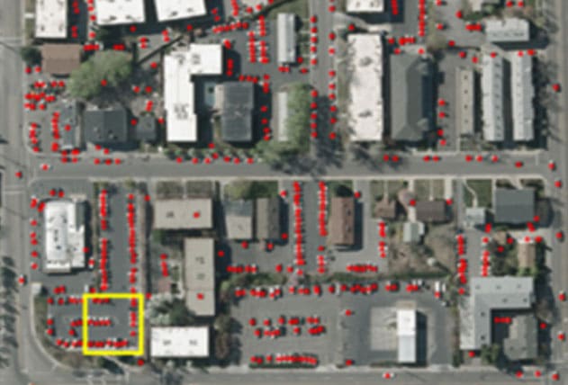 farther out view of allseen identifying cars in a parking lot