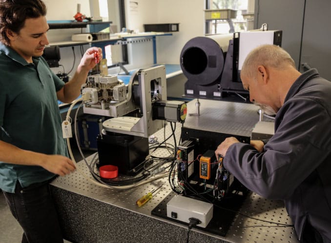 two men working on Arete's Video ATR Common Module